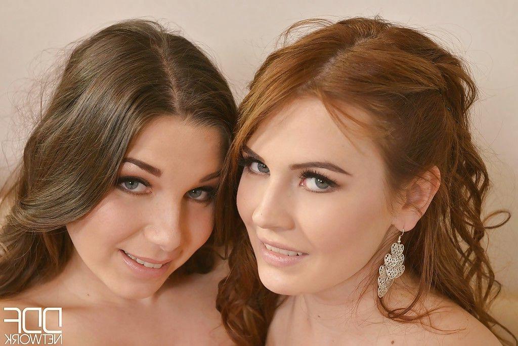 European teen lesbians Timea Bella and Diana Dolce keep fucking each other with dildos Photo