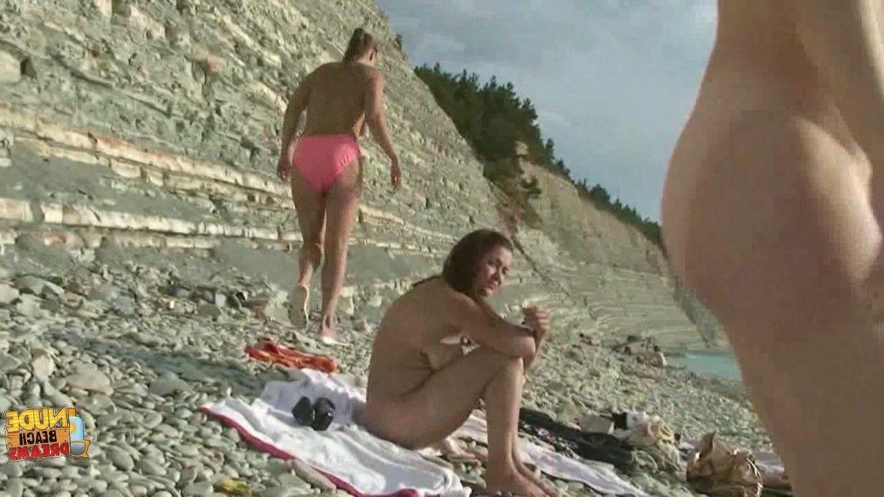 Totally naked princess drinking and enjoying on the beach Photo